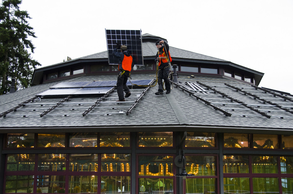 installing solar panels on historic carousel roof, energy, solar panel